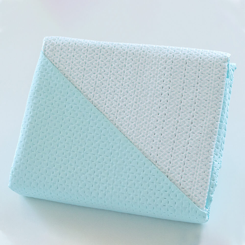 Geometric patchwork quilt with thin padding. Beige.