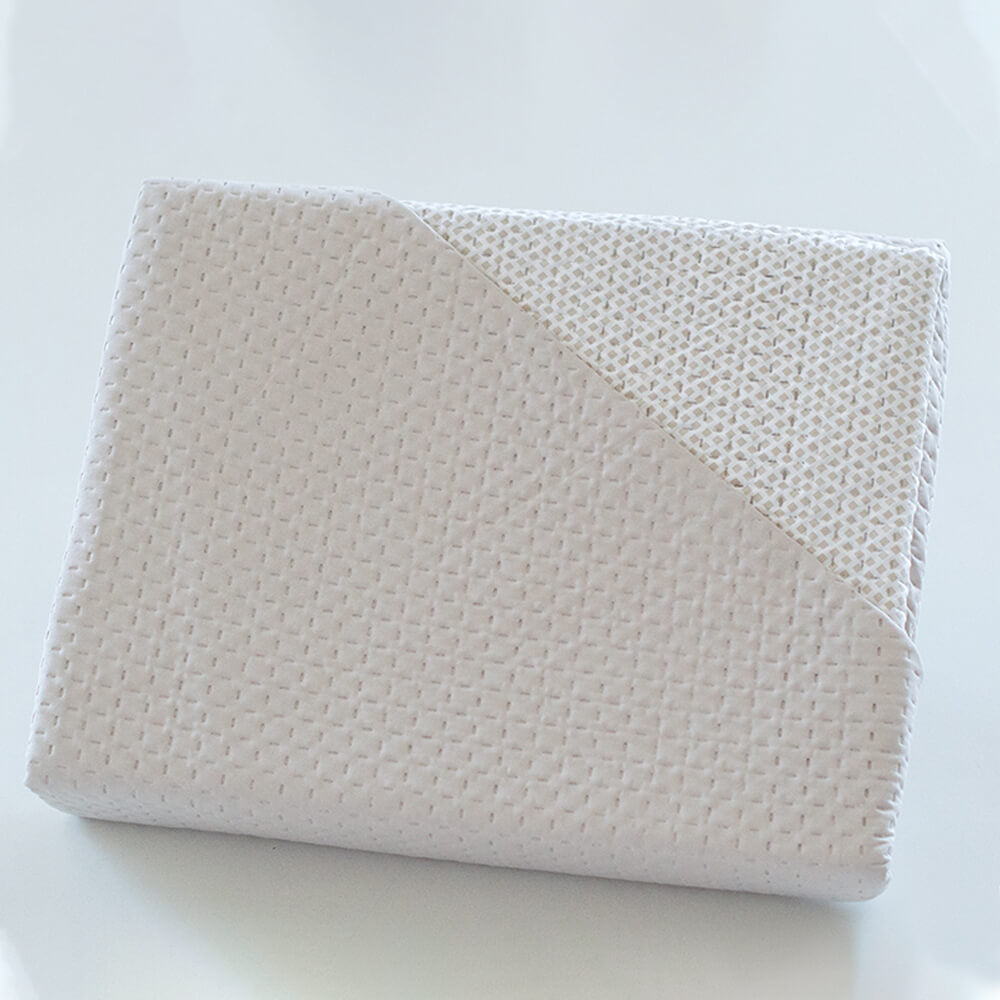 Geometric patchwork quilt with thin padding. Beige.