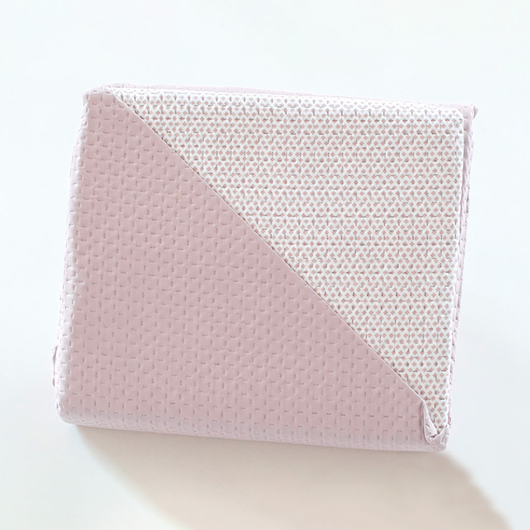 Geometric patchwork quilt with thin padding. Beige.