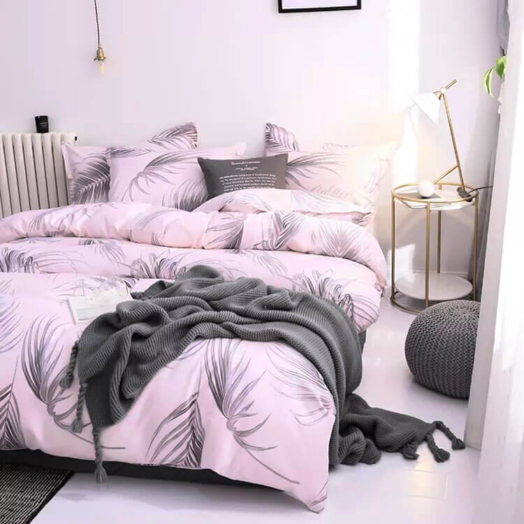 Printed duvet cover with black leaves and pale pink background, extra soft microfiber.