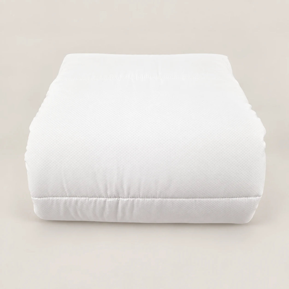 Eco 250 g duvet folded, showing its soft, lofty quilting. - Oma Home
