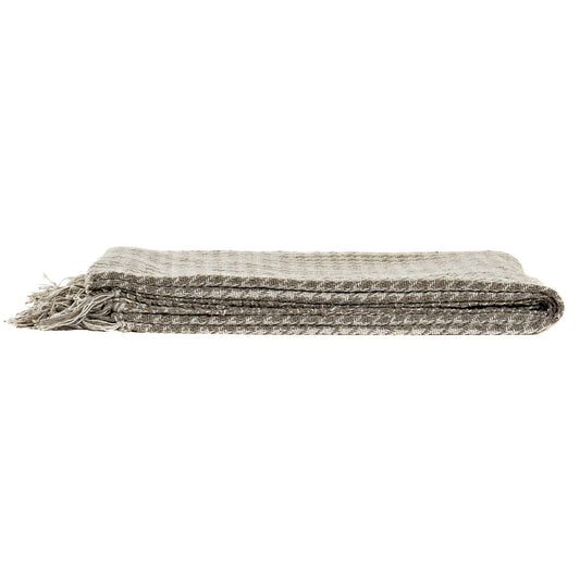 Plaid blanket 100% geometric cotton in beige and white.